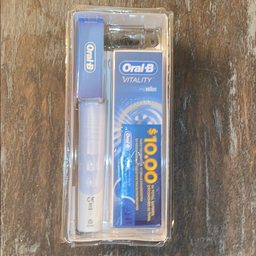 Oral B vitality electric toothbrush floss nwt nib